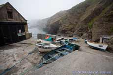 Fishing boats hauled up in Polpeor Cove