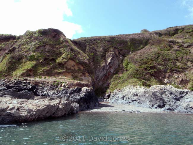 Small cove north of Porthallow with raised beach deposit on left side, 15 May